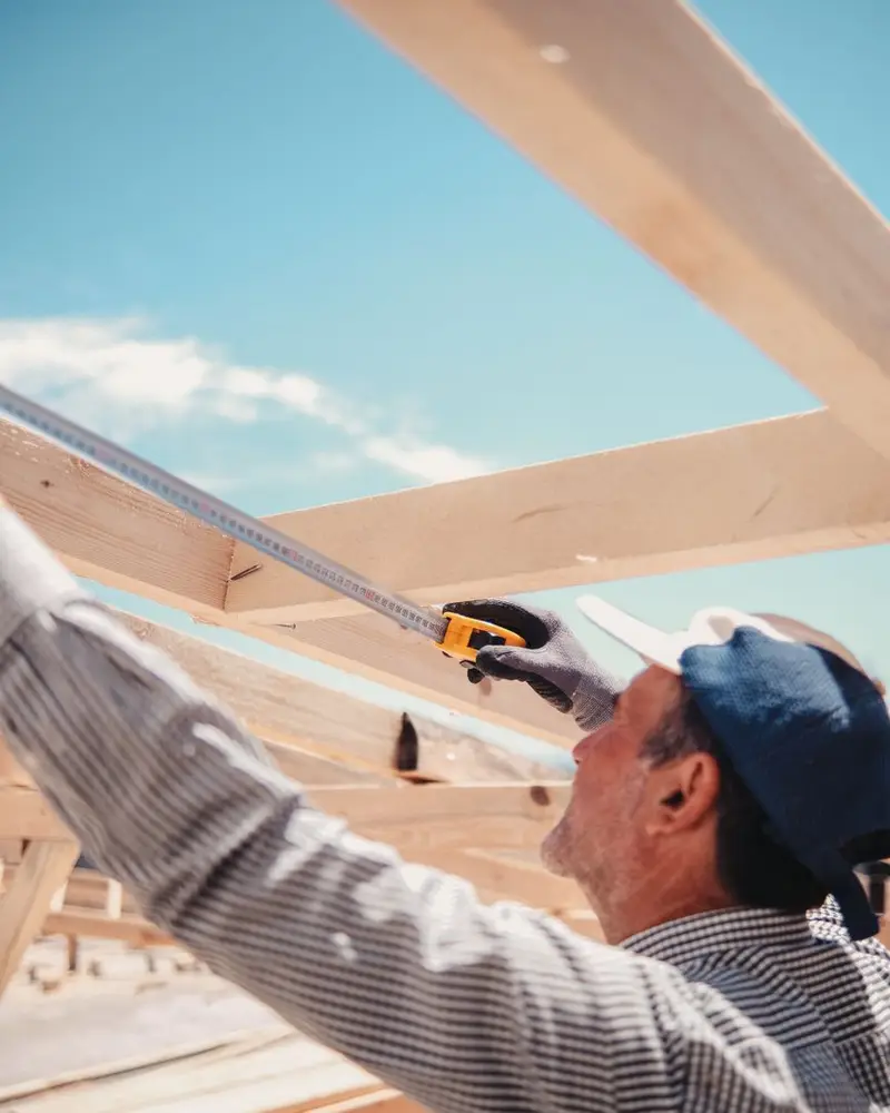 Contractor SEO company work: a general contractor reviewing plans with a client