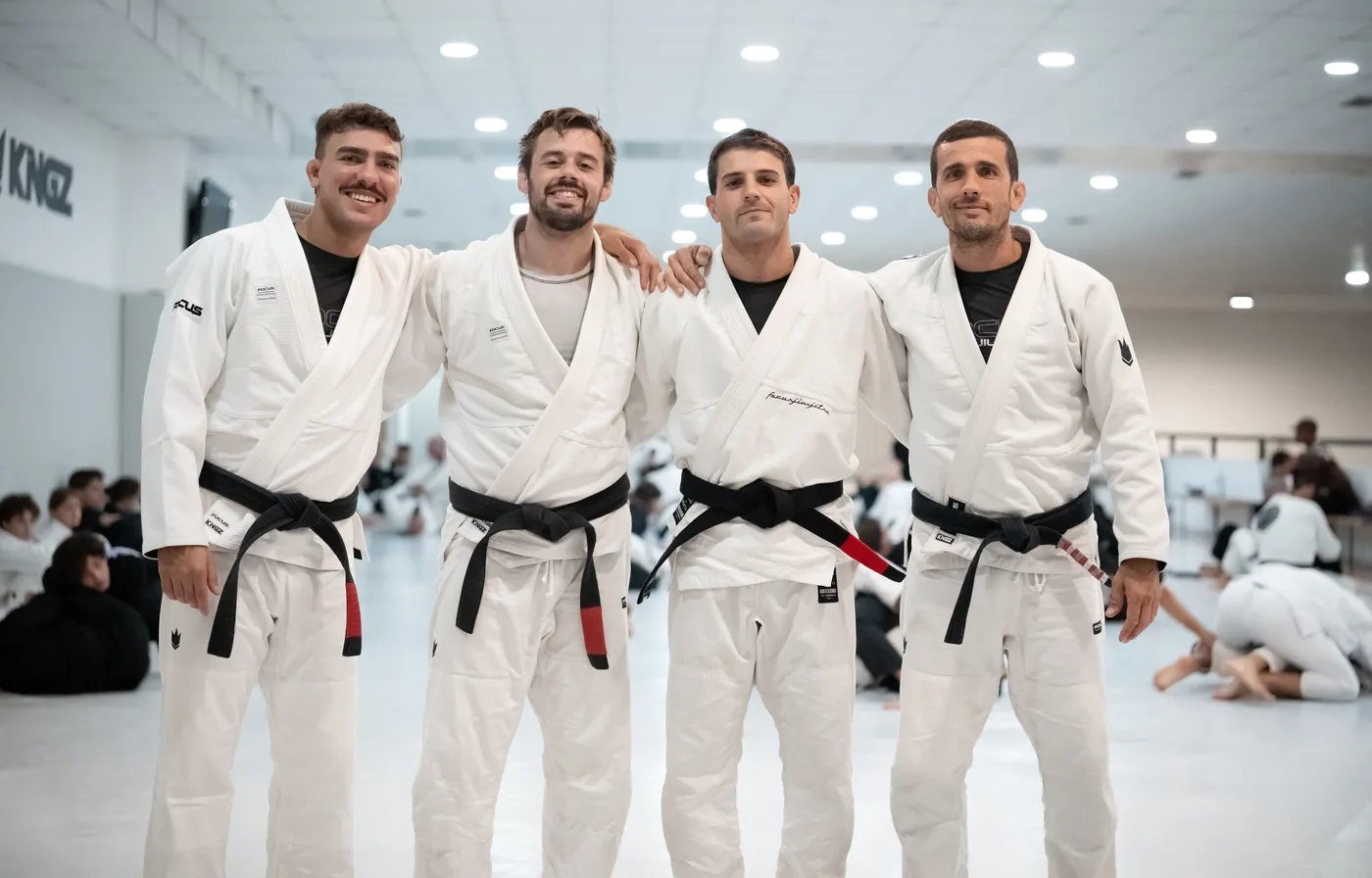 About vasco: Vasco, SEO freelancer (second from left), with fellow BJJ black belts